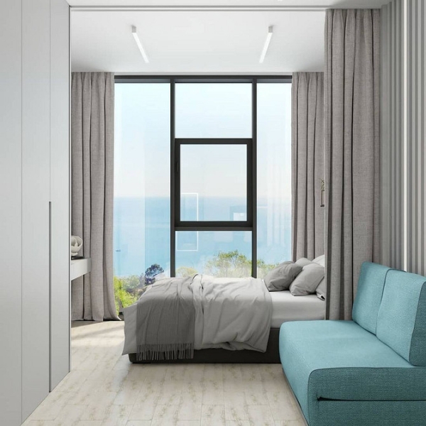 Як і з чим поєднувати бірюзовий диван в інтер'єрі