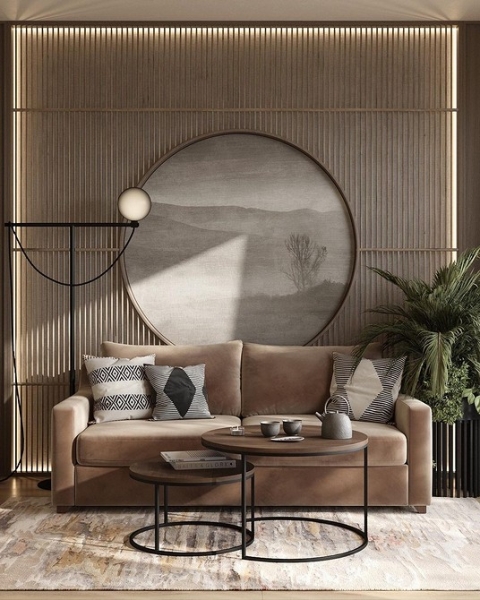 Інтер'єр вітальні з коричневим диваном