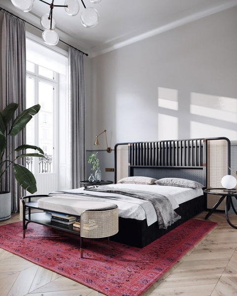 Спальня з акцентом на велике дерев'яне узголів'я ліжка